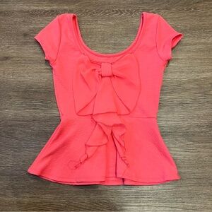 bright pink bow peplum top
brand charlotte russe
size xs
bow is on the back